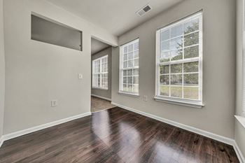 Living room with window and wooden floor